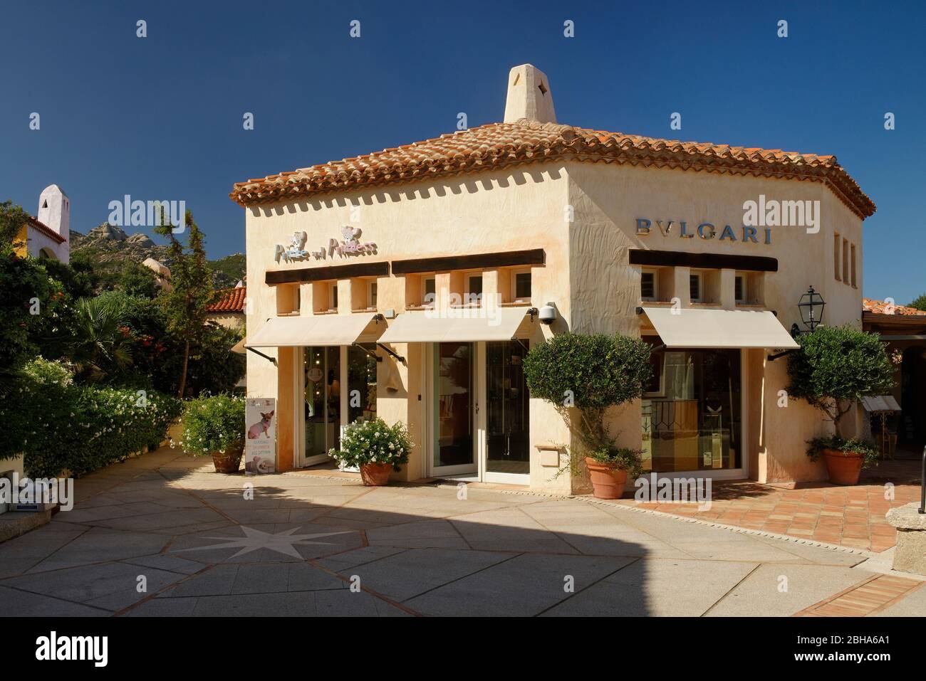 Neosarian style shops and residential buildings in Porto Cervo, Costa Smeralda, Mediterranean sea, Olbia-Tempio province, Sardinia, Italy Stock Photo