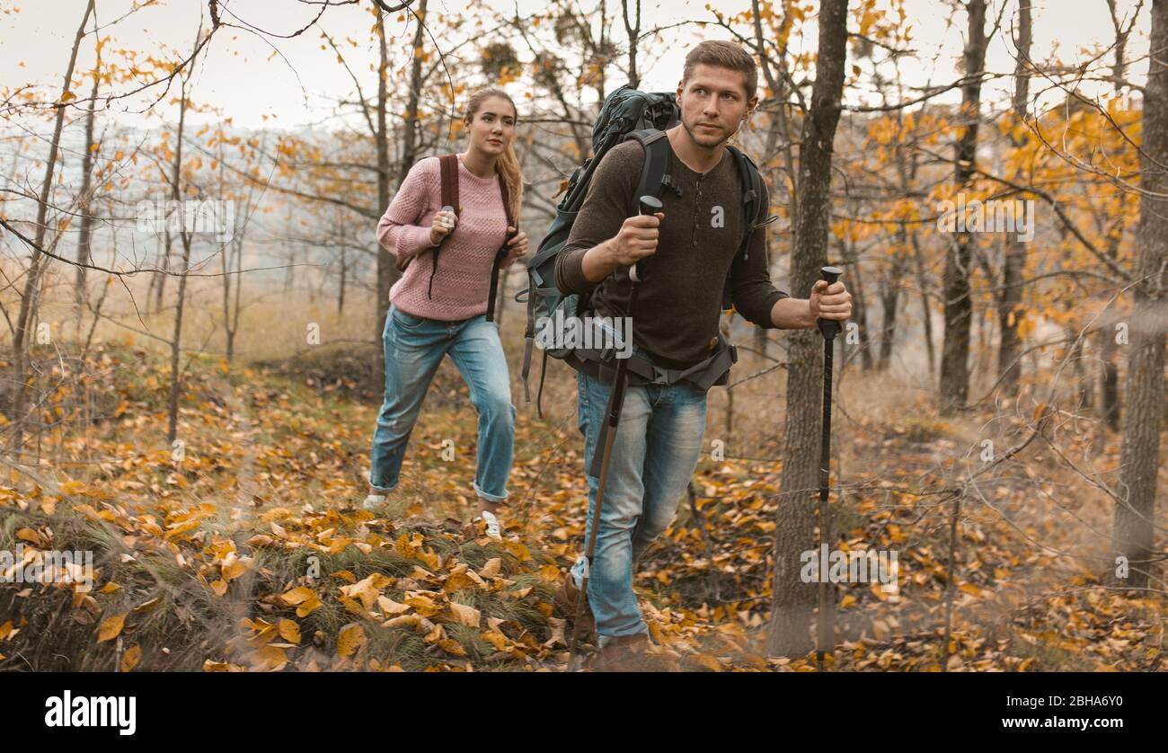 Man and women hiking hi-res stock photography and images - Alamy