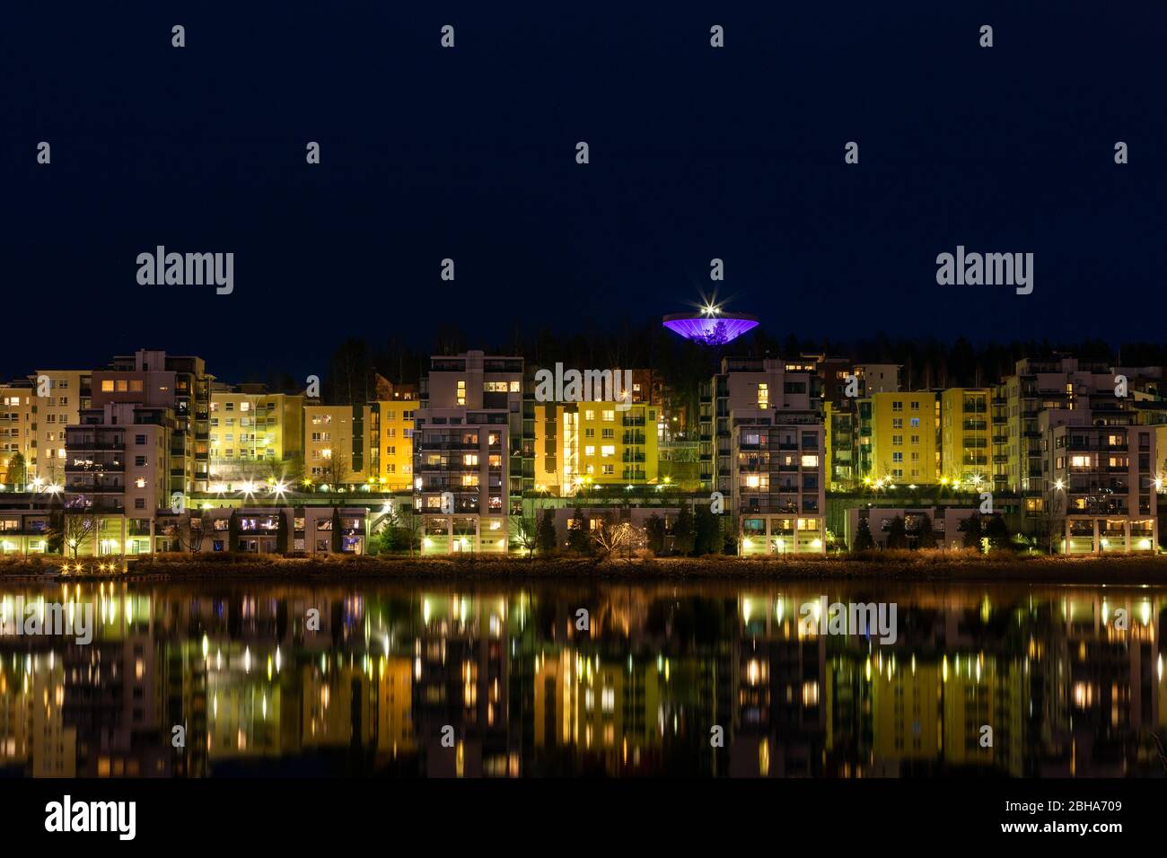 Waterfront residential buildings, still water and water reflections in Jyväskylä Stock Photo