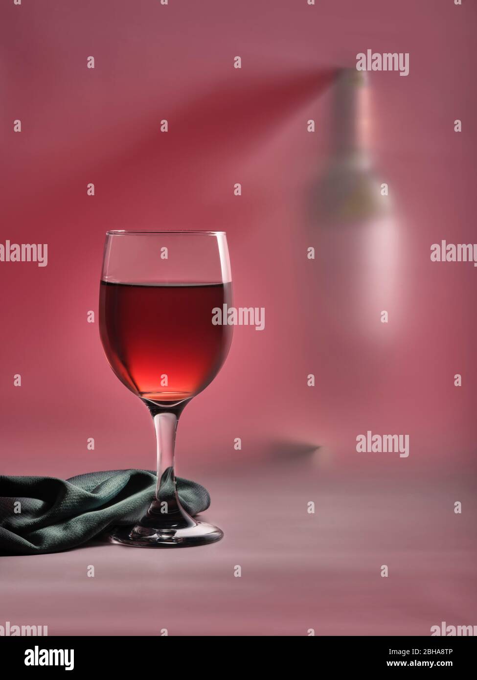 Red wine glass with bottle Stock Photo