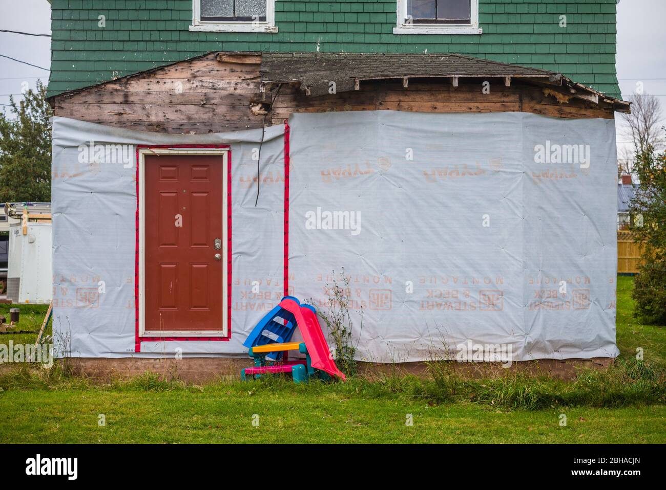 Canada, Prince Edward Island, Georgetown, house under cosnstruction with plastic children's toys Stock Photo
