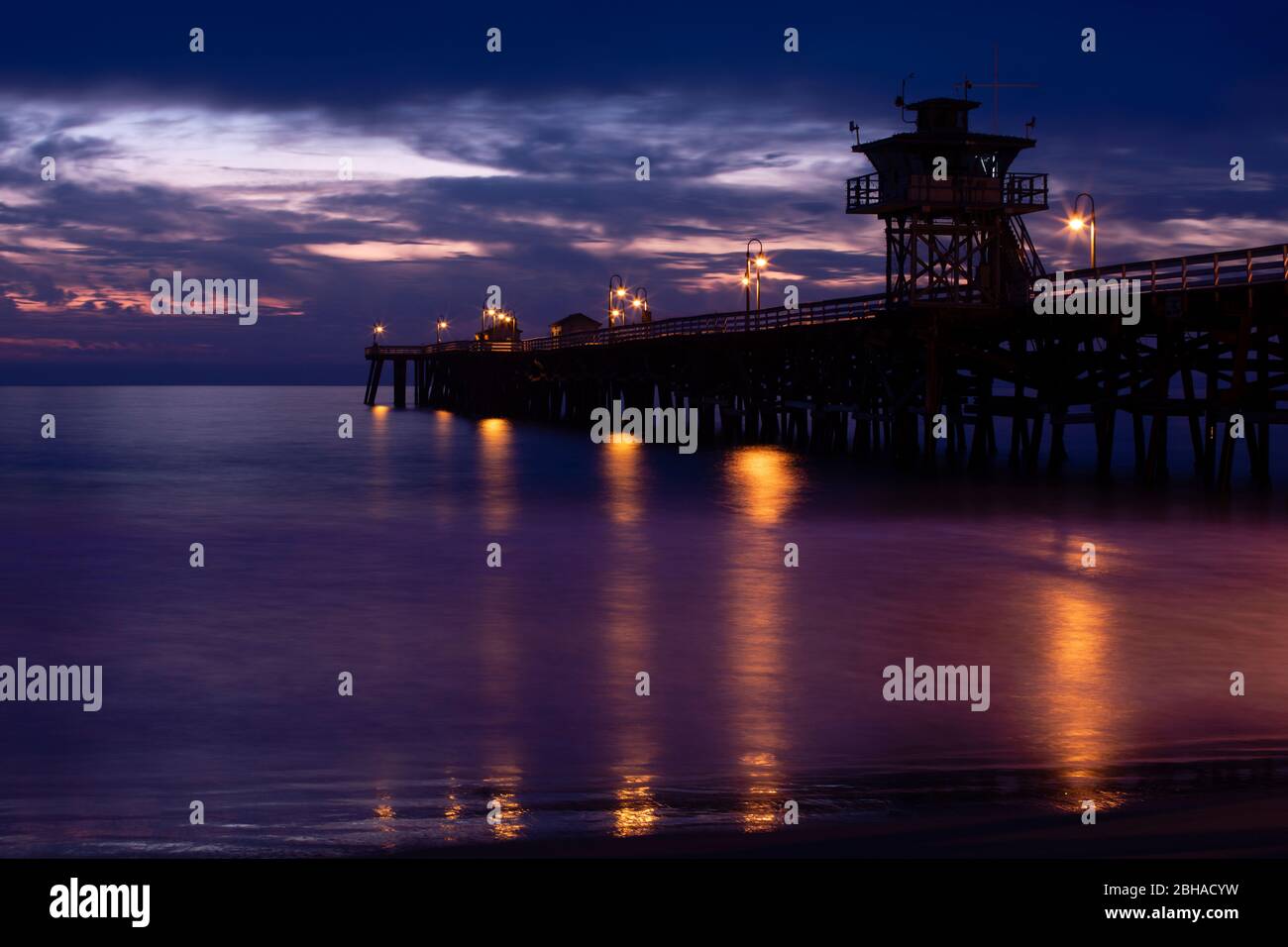 Silhouette of pier at sunset, San Clemente, California, USA Stock Photo