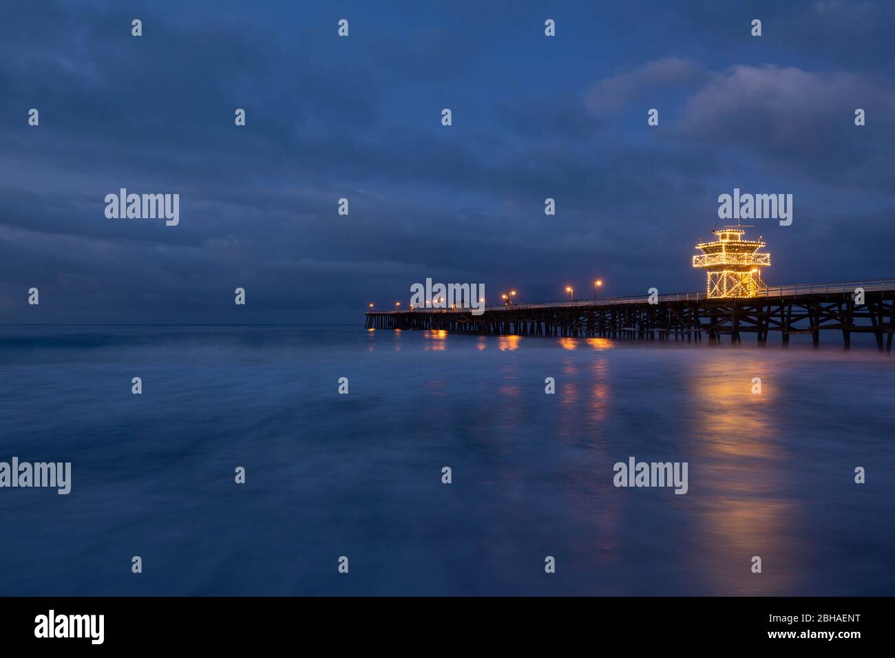 Christmas lights on San Clemente Pier at night, California, USA Stock