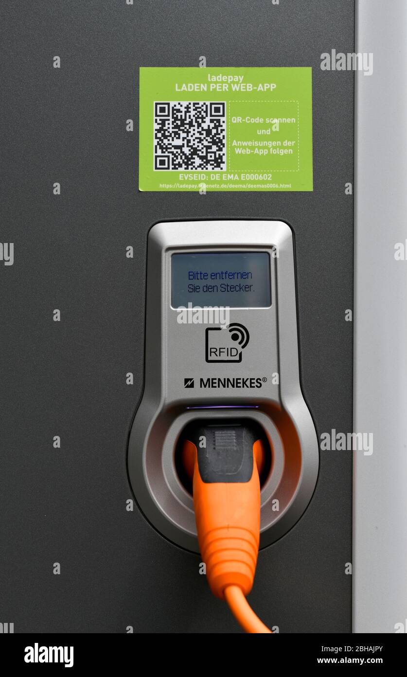 Charging plug with cable to charging station for electric cars