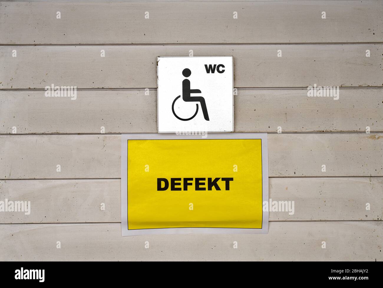 Sign Disabled toilet, broken, district Spandau, Berlin, Germany Stock Photo