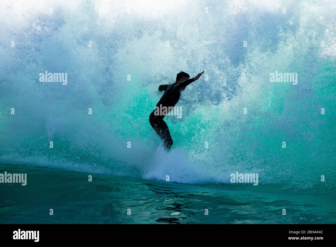 Wetsuit surfer hi-res stock photography and images - Alamy