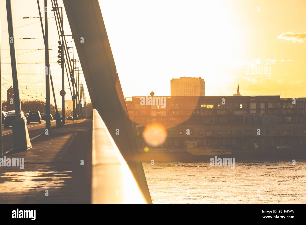 Die Kölner Severinsbrücke bei Sonnenuntergang. Stock Photo