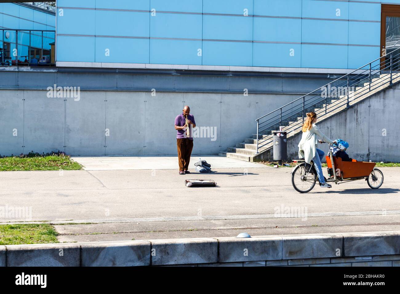 A street musician at the river Spree in Berlin. Editorial use only. Stock Photo