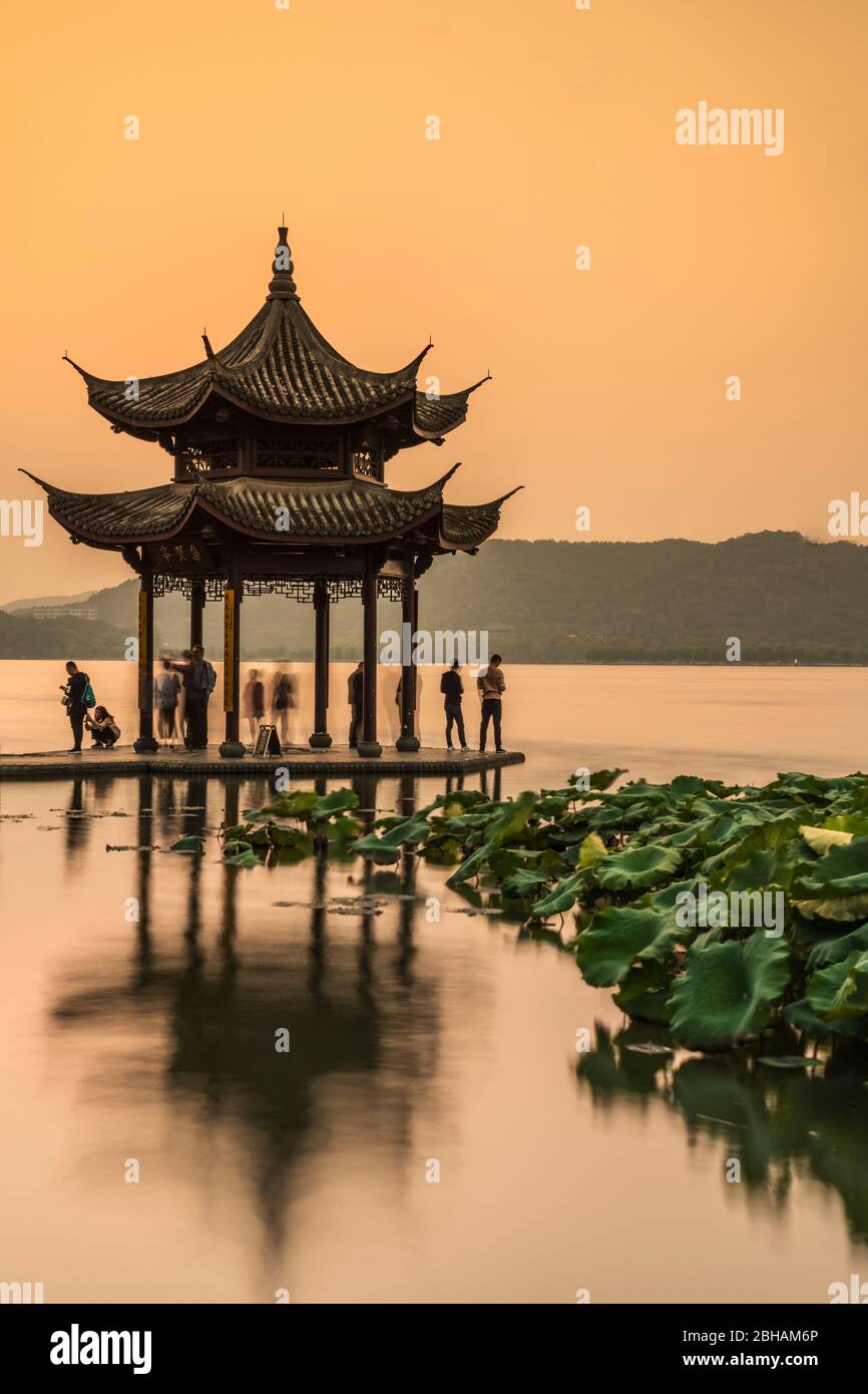 Asia, People's Republic of China, East China, Zhejiang Province, Hangzhou, XÄ«zÇ Hú, pagoda in the evening light Stock Photo