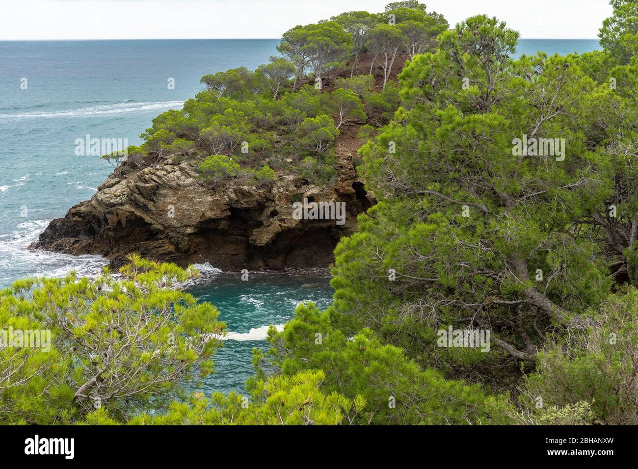 Europe, Spain, Catalonia, Costa Brava, Clouded rocks on the Costa Brava between Cadaqués and Roses Stock Photo