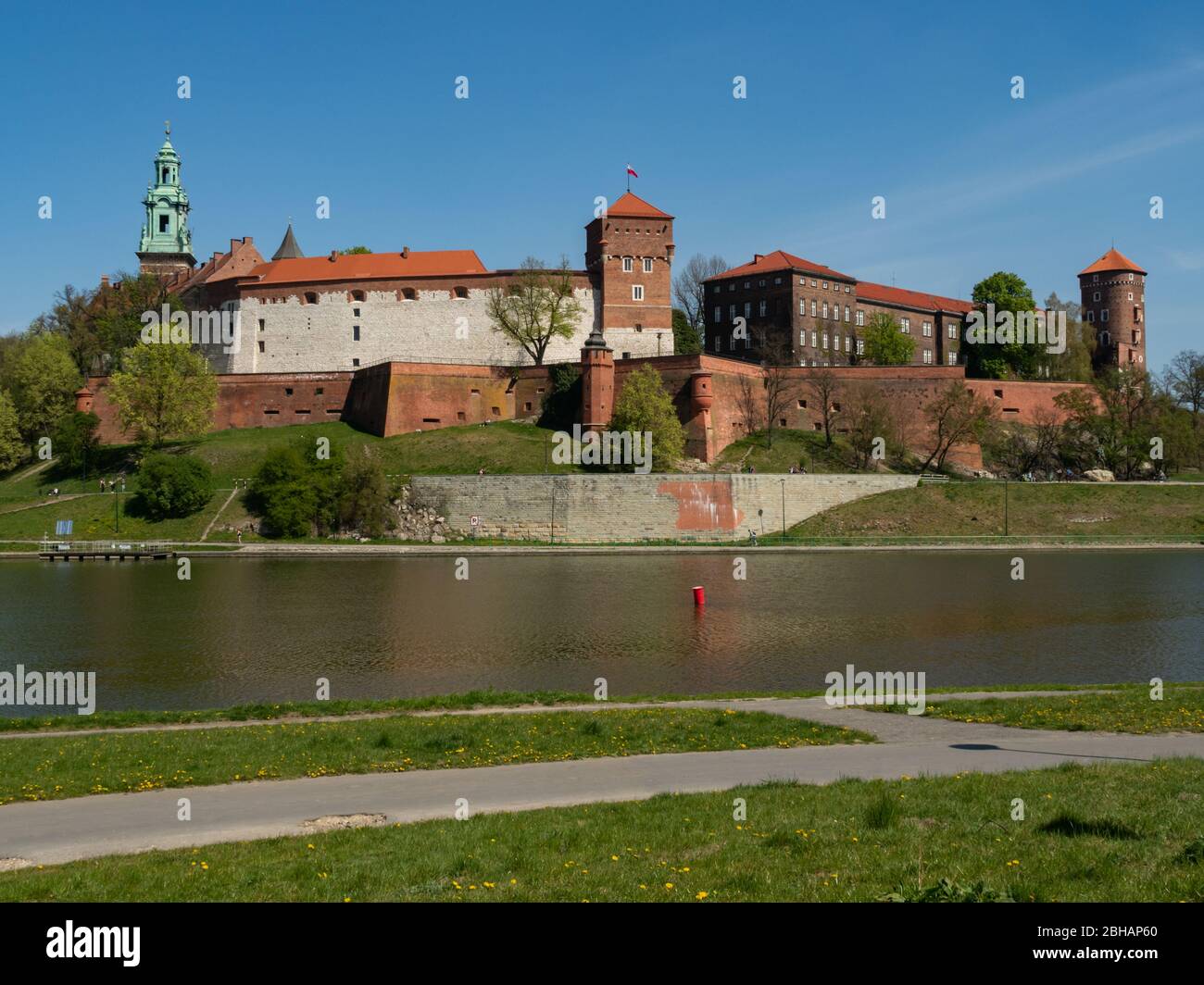 The former Royal residence of Polish monarchy, Wawel Castle, Krakow, Poland. Spring time, view from the Vistula river boulevard. Stock Photo