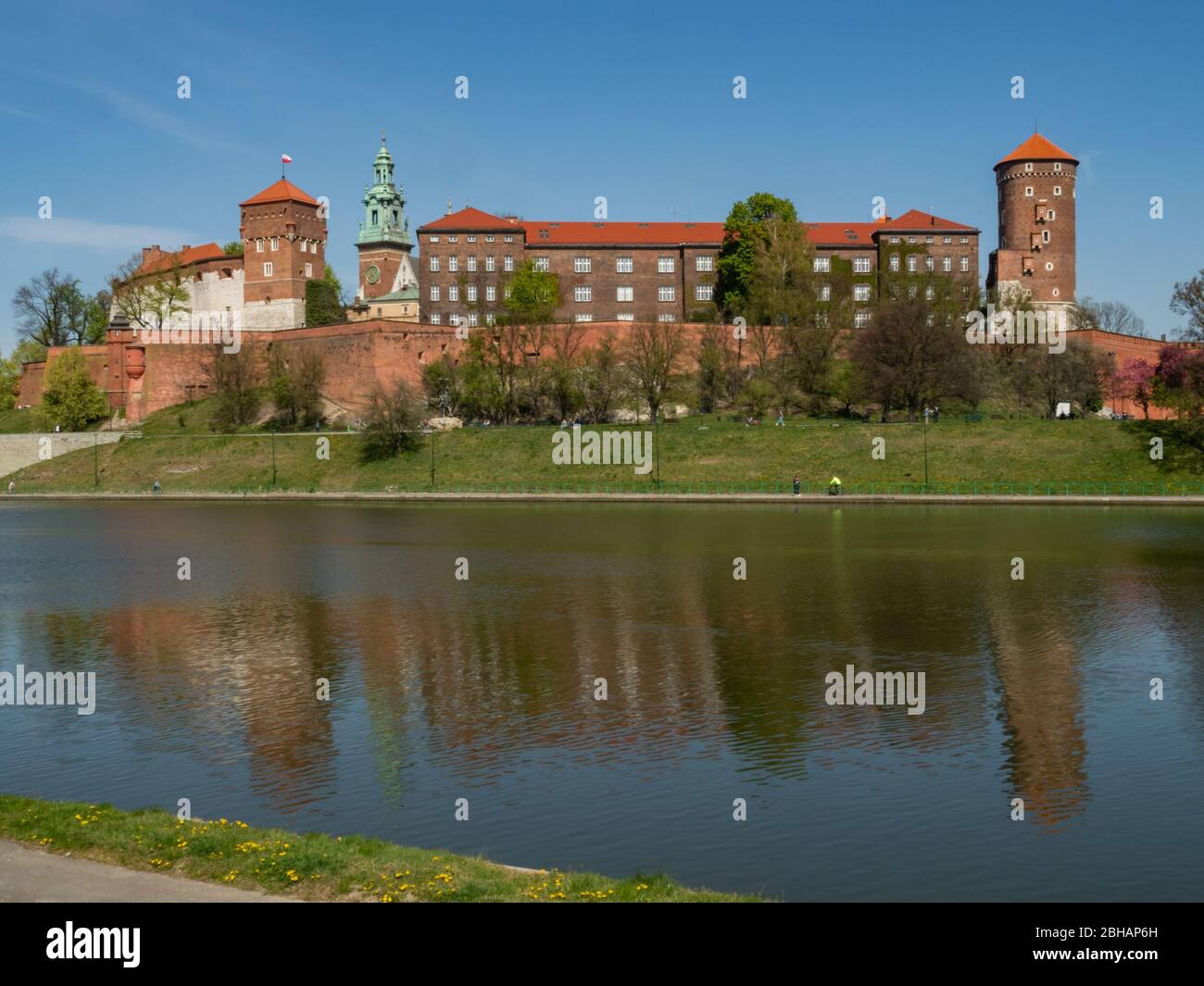The former Royal residence of Polish monarchy, Wawel Castle, Krakow, Poland. Spring time, view from the Vistula river boulevard. Stock Photo