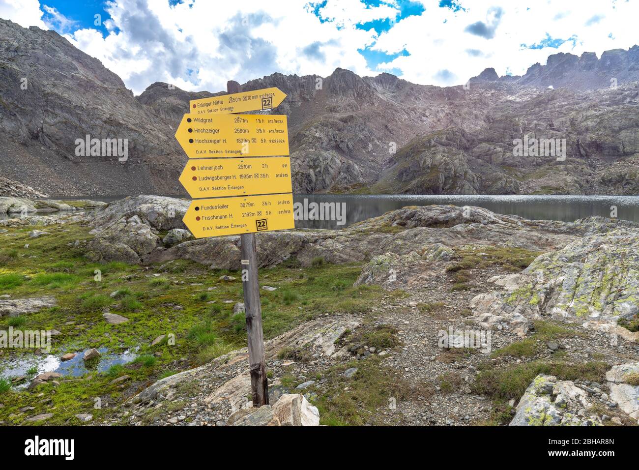 Europe, Austria, Tyrol, Ötztaler Alps, Umhausen, signpost with tour offer at the Wettersee behind the Erlanger Hütte Stock Photo