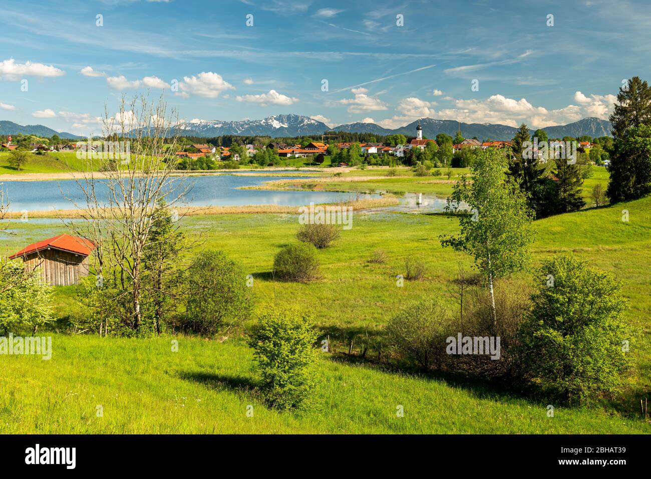 The meadows and hills at Fohnsee, with a view to Iffeldorf and the ...