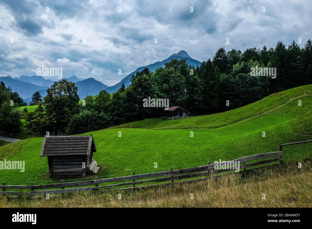 Alpine meadows under a dramatic sky Stock Photo