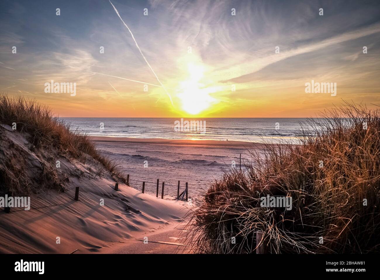 Path to the North Sea beach with setting sun Stock Photo - Alamy