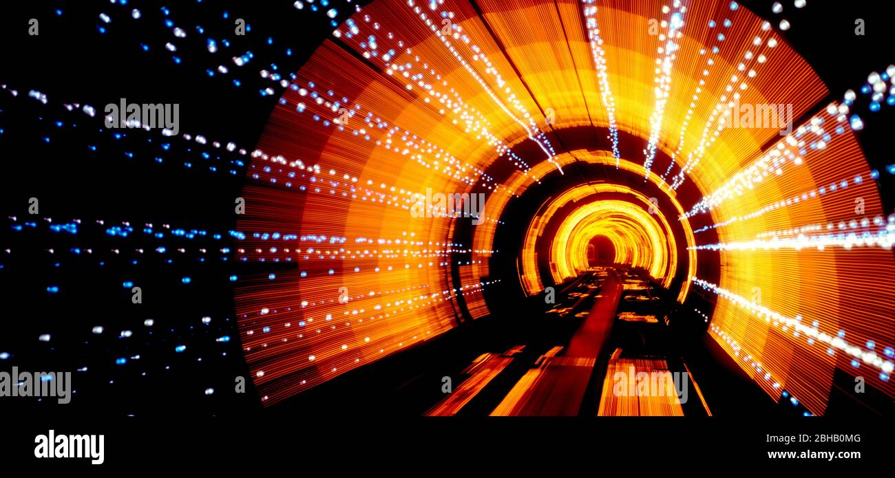 Abstract light patterns from moving train, The Bund Tourist Tunnel, Shanghai Province, Shanghai, China Stock Photo