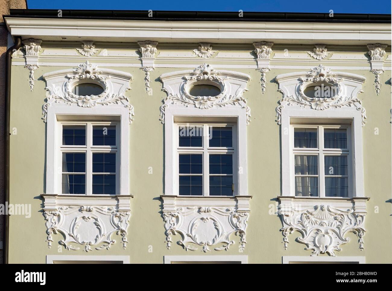 Germany, Bavaria, Upper Bavaria, Rosenheim, community center, Neurokkoko, stucco façade, three windows, detail Stock Photo