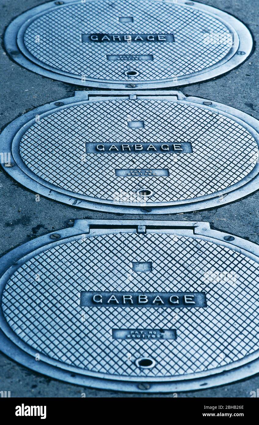 USA, Lousianna, New Orleans, cast iron covers serve as immediate garbage disposers Stock Photo