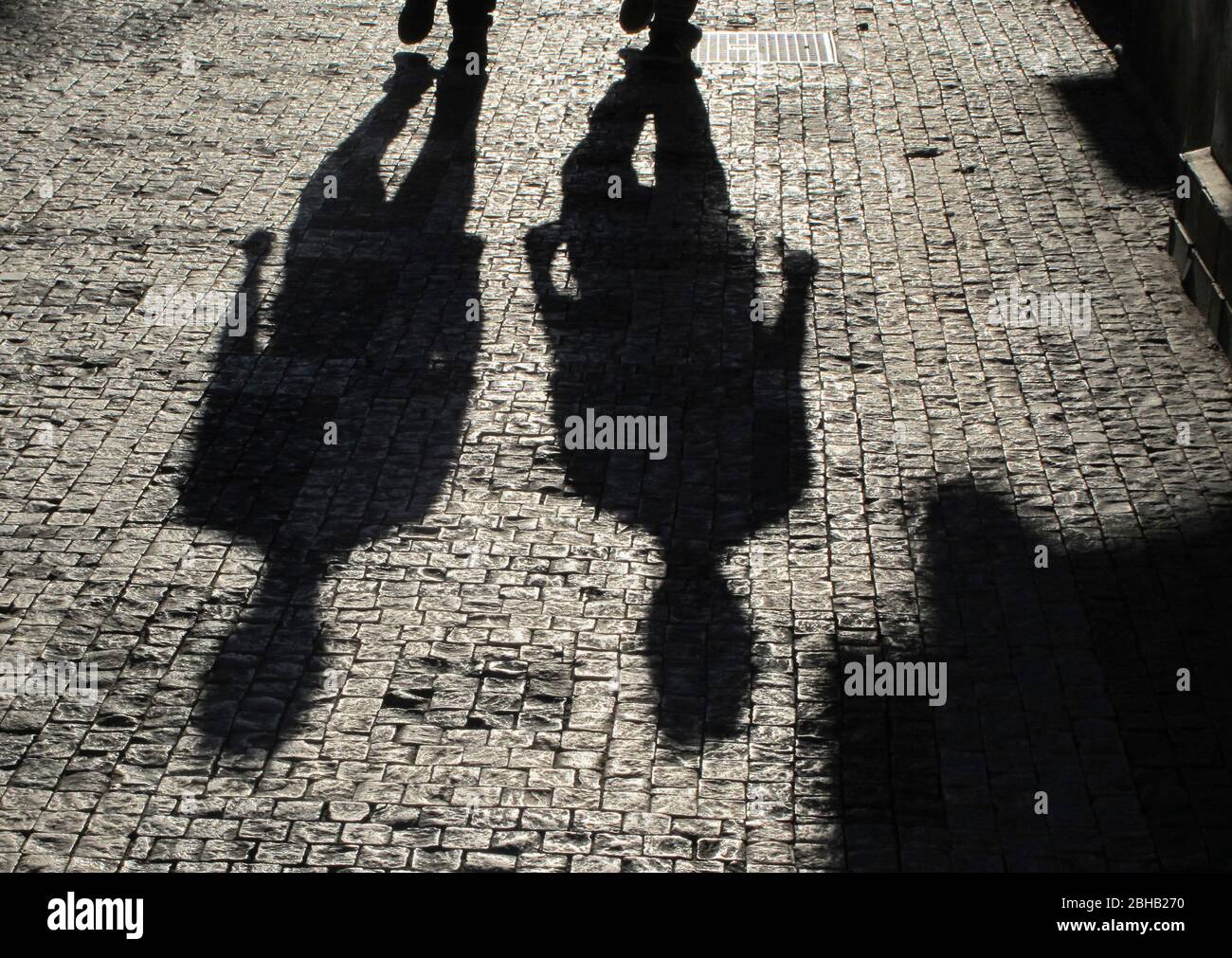 Couple's shadow on sidewalk, Prague - Letna, Czech Republic Stock Photo
