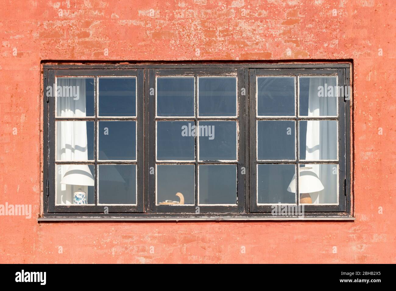 Denmark, Ringkøbingfjord, Varde, Nymindegab, window of a holiday home. Stock Photo
