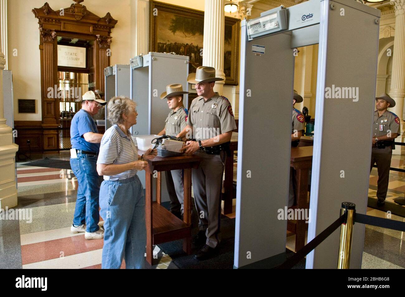 Austin Texas USA, May 21 2010: Beginning today new security measures are in place at the Texas Capitol. All visitors, including lobbyists, must now walk through metal detectors as they enter the building. Uniformed Department of Public Safety officers staff the detection stations at the Capitol's main entrance. ©Marjorie Kamys Cotera/Daemmrich Photography Stock Photo