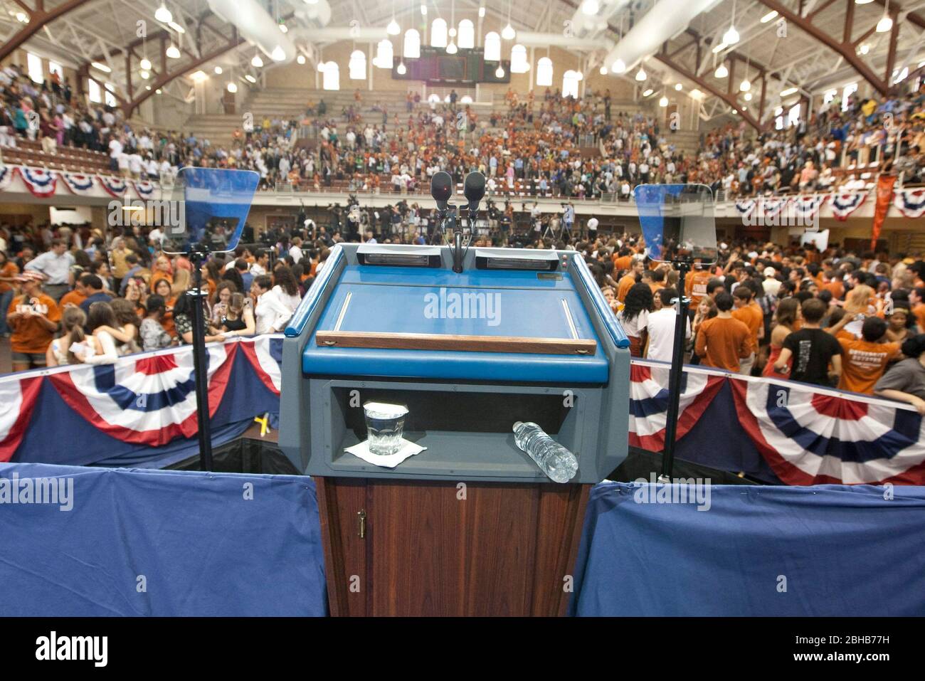 Austin Texas USA, August 9 2010: View from presidential lectern with microphones and flanked by teleprompters as crowd departs Gregory Gym after U.S. Pres. Barack Obama's speech on the University of Texas campus. ©Bob Daemmrich Stock Photo