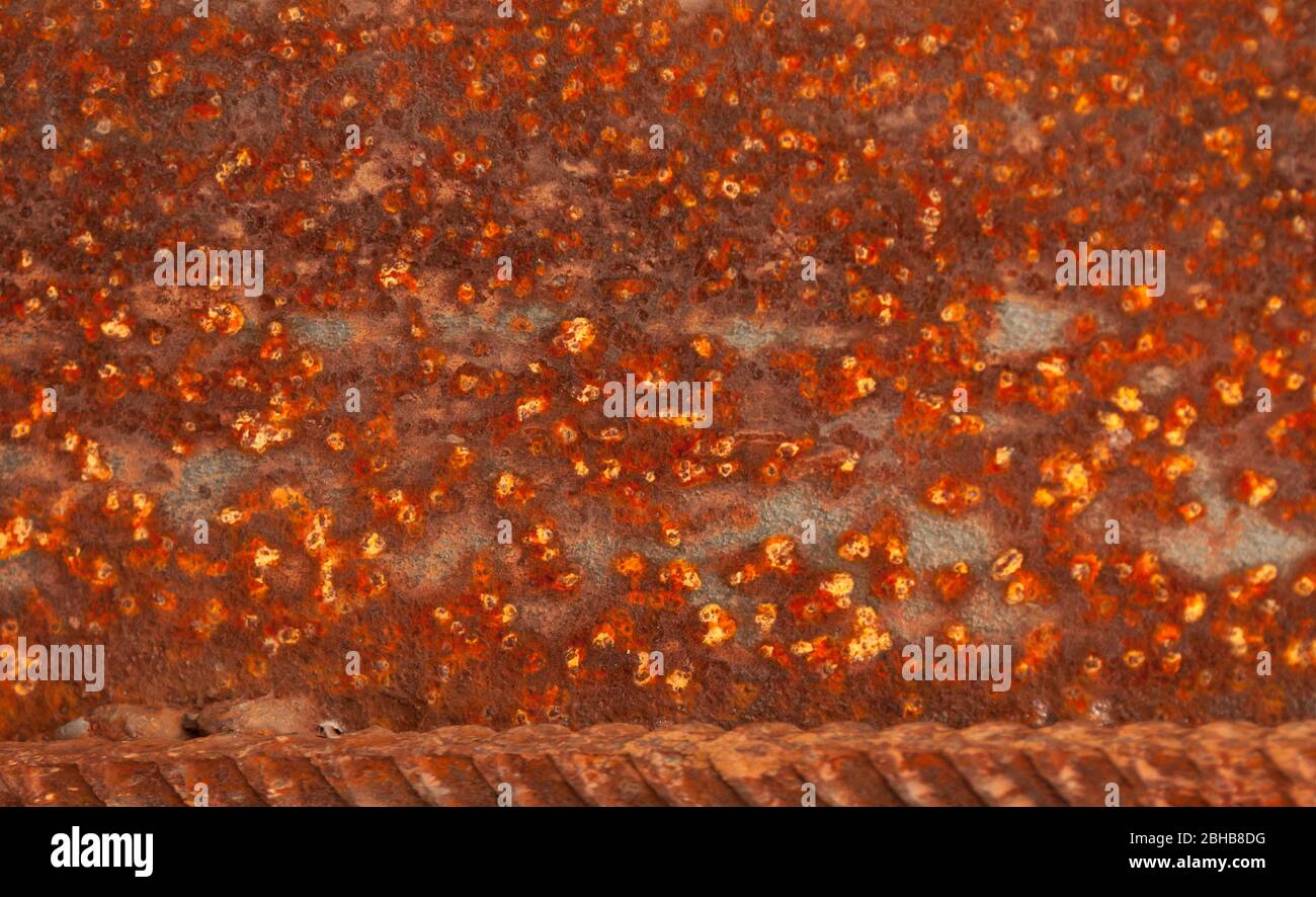 Beautiful grungy rusty picture, taken close up. Damaged rust plate. Abstraction, rusty background Stock Photo