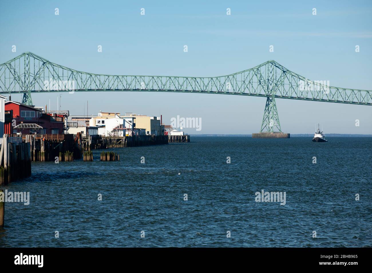 View of sea, harbour and Astoria Bridge behind, Oregon, USA Stock Photo