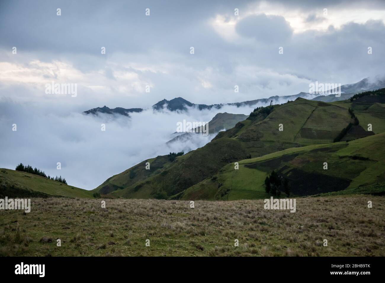 White clouds enter the Andean highlands at sunset in Simiatug Stock Photo