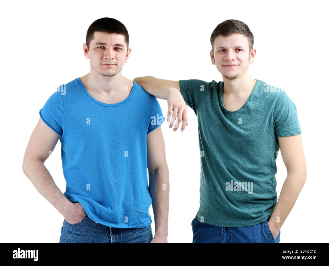 Two handsome young men isolated on white Stock Photo - Alamy