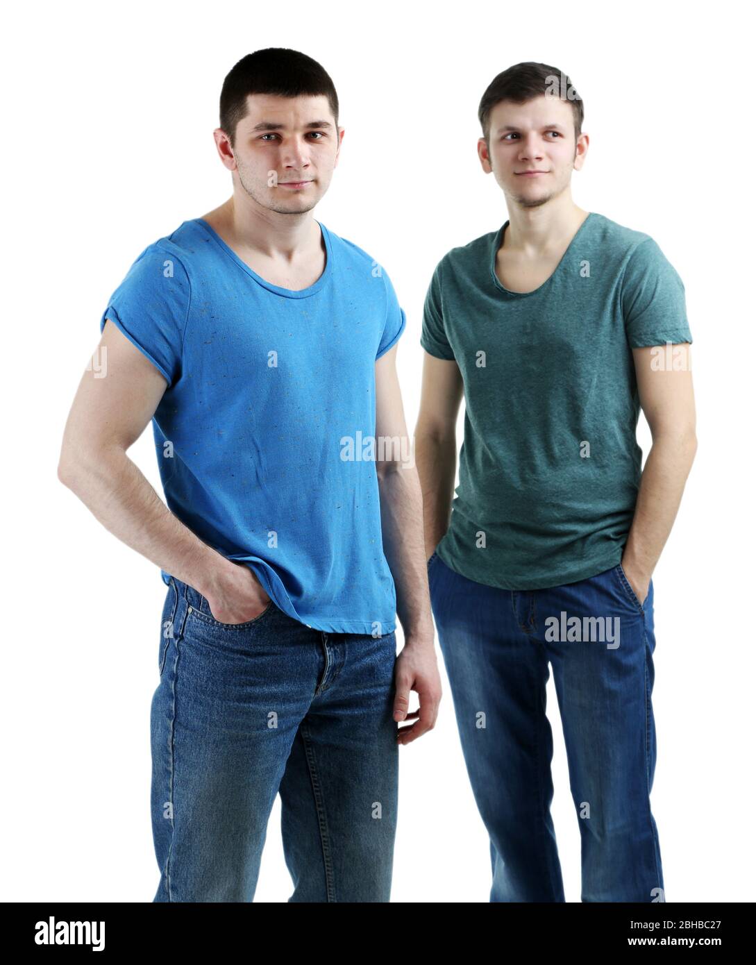 Two handsome young men isolated on white Stock Photo - Alamy