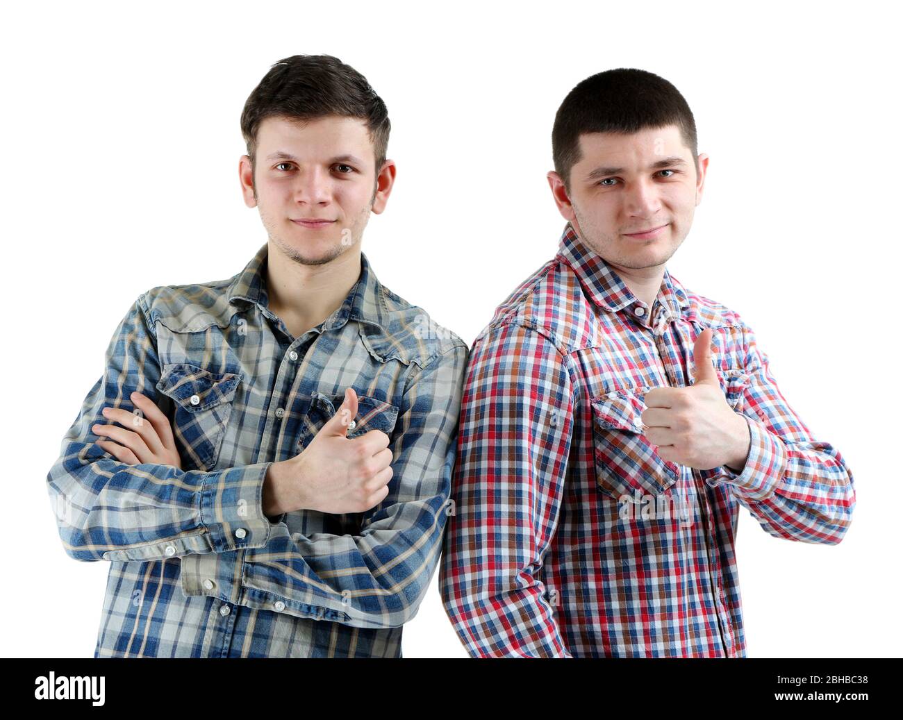 Two handsome young men isolated on white Stock Photo - Alamy