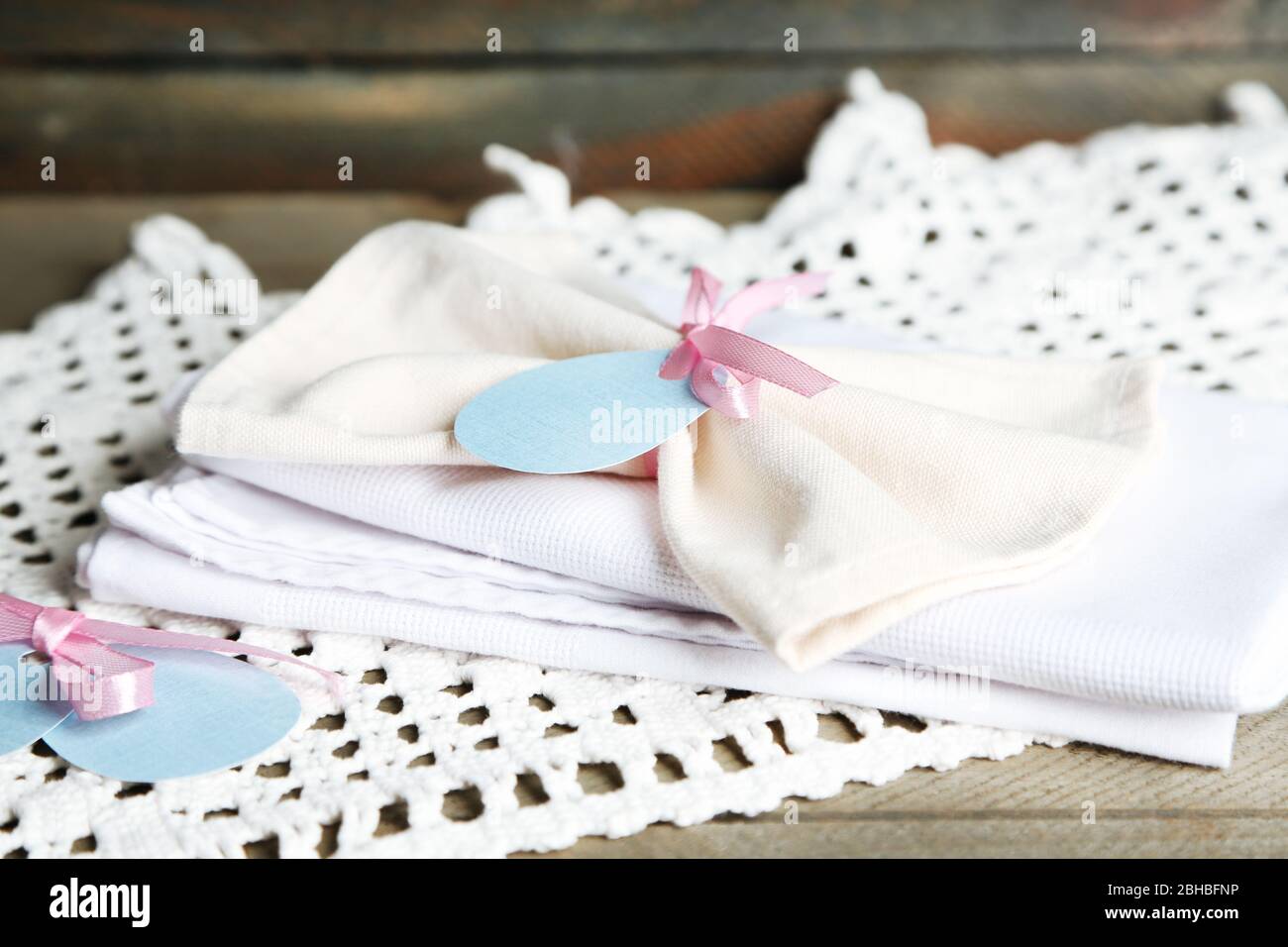 Napkins with Easter decorations  on wooden background Stock Photo