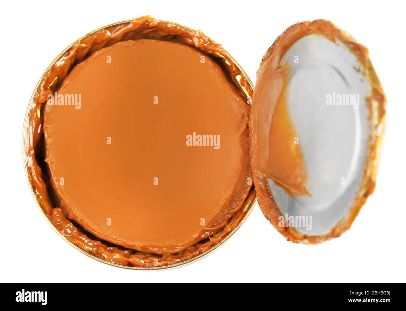 Can of boiled condensed milk isolated on white Stock Photo Alamy