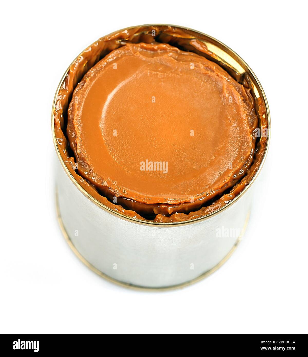 Can of boiled condensed milk isolated on white Stock Photo Alamy