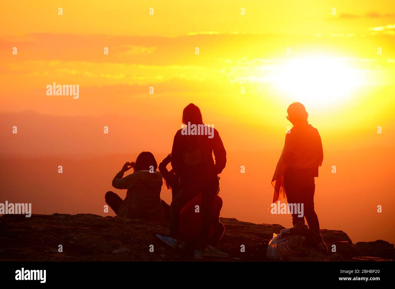 Peope and sunrise background with warm tone color and copy space. Stock Photo