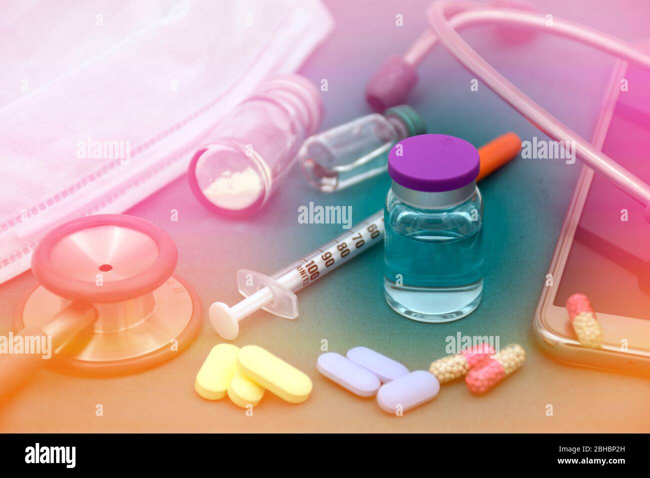 Vaccine, oral medicine, stethoscope and face mask in diagnostic and treatment with new vaccine invention concept, related to COVIT-19 and new outbreak Stock Photo