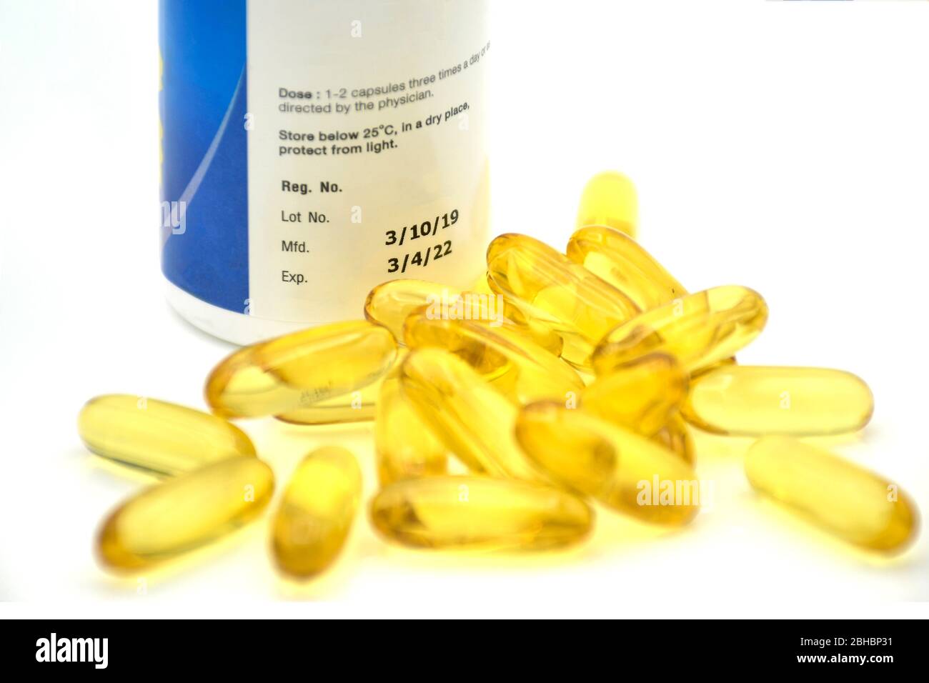 Soft gelatin capsule with manufacturing date and expiry date on some