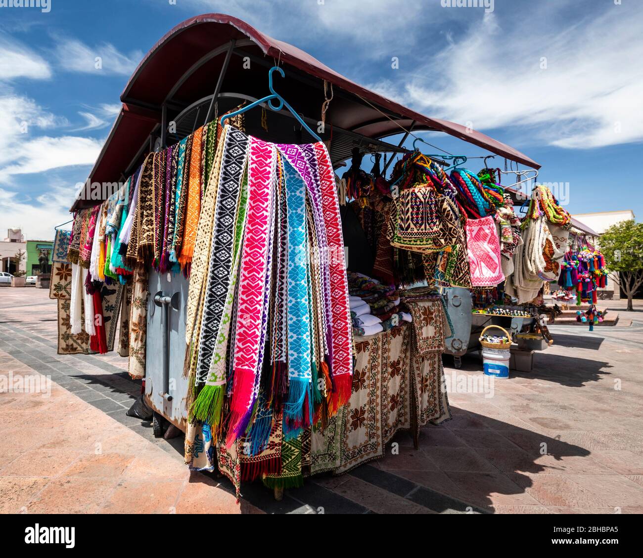 Table runners and other textiles for sale in a street market in Queretaro, Mexico. Stock Photo