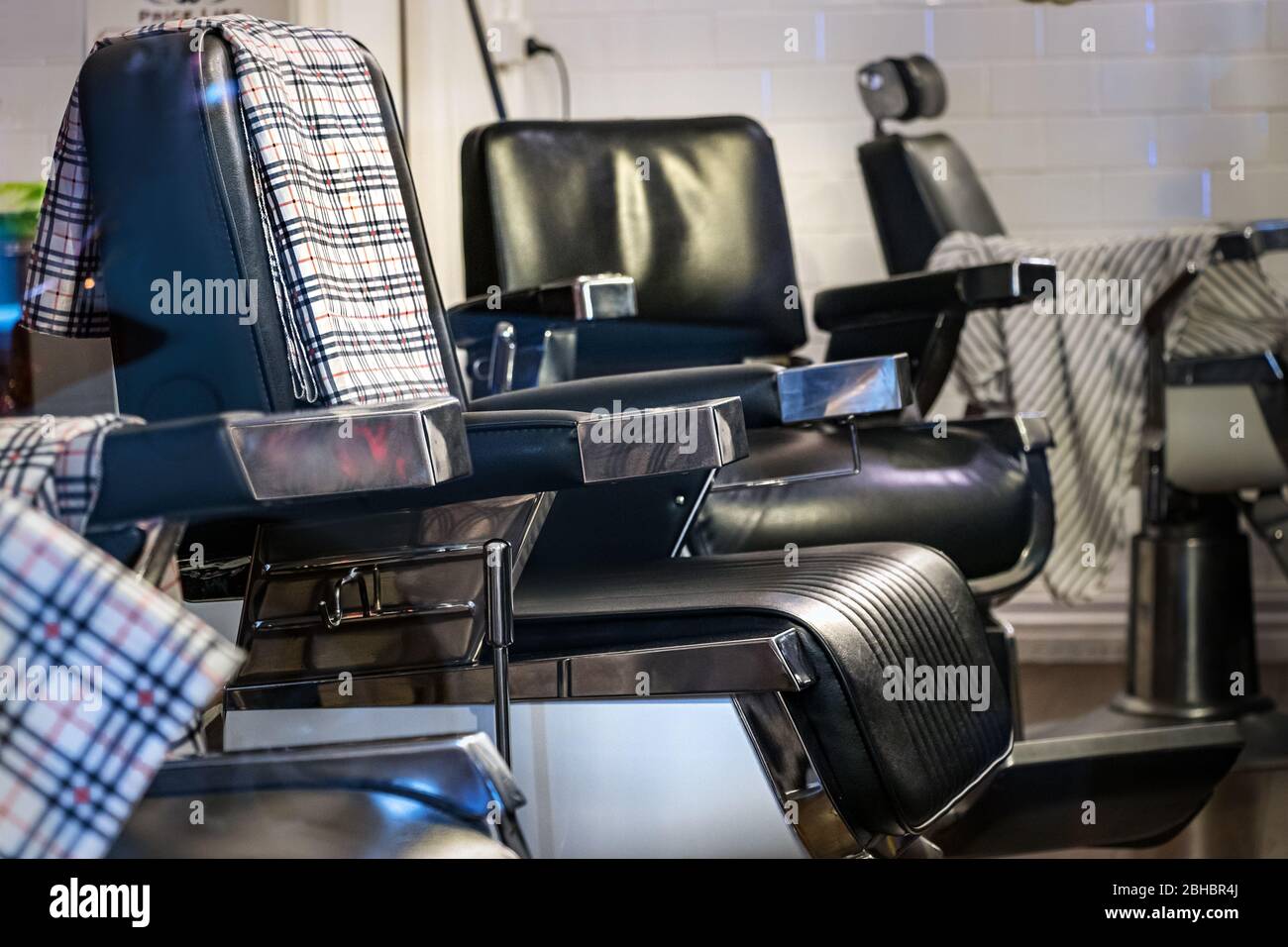 Vintage hair dresser chair empty. Barber shop closed during pandemic