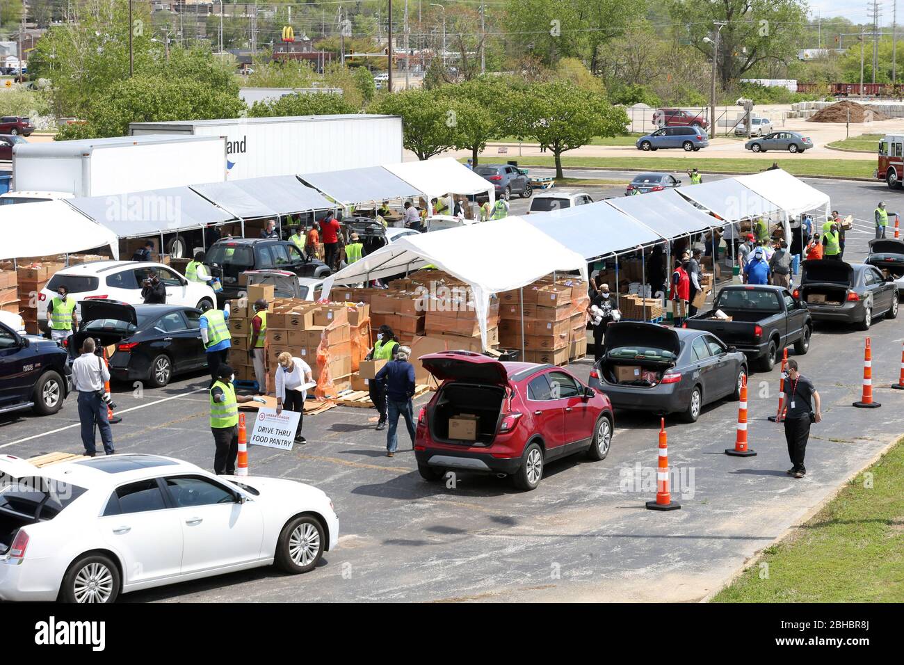 Alton, United States. 24th Apr, 2020. Cars line up for food in the loading area in Alton, Illinois on Friday, April 24, 2020. Over 1700 cars lined up to receive food, distributed by the Urban League of Greater St. Louis. Photo by Bill Greenblatt/UPI Credit: UPI/Alamy Live News Stock Photo