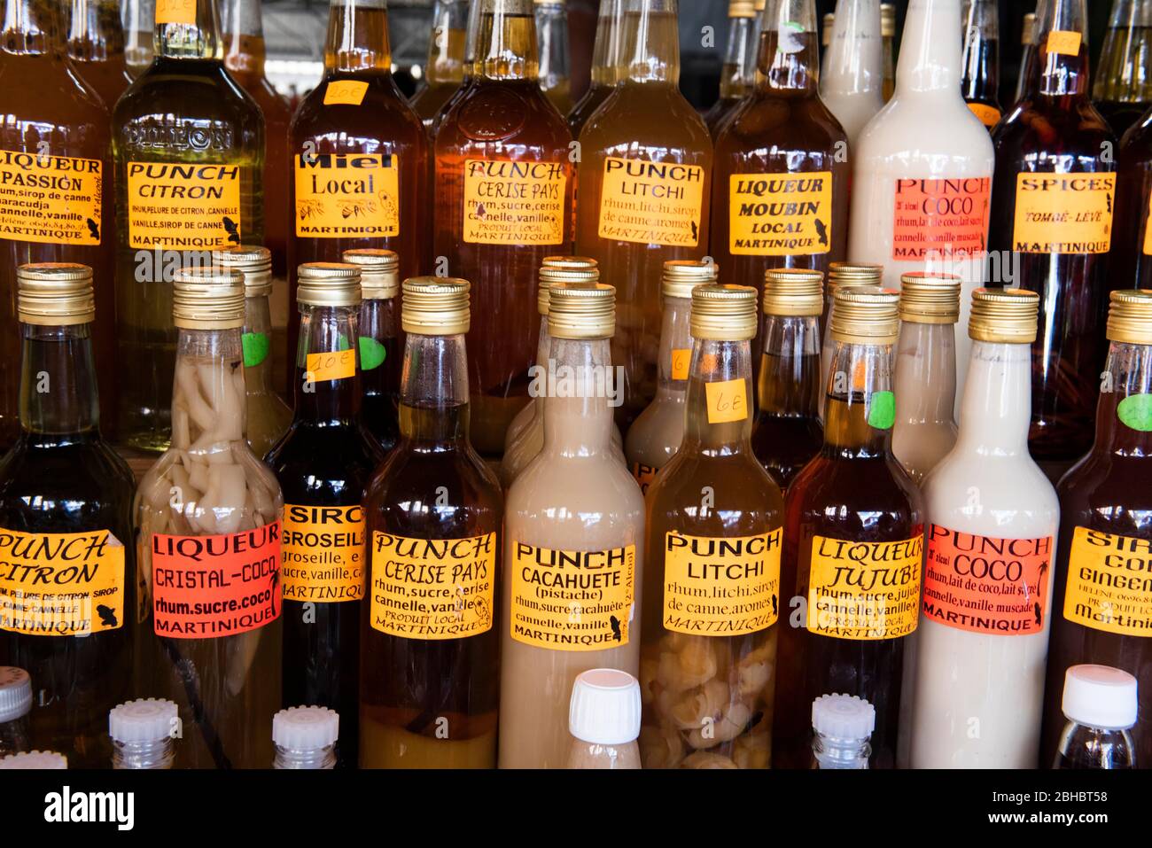 Caribbean, Lesser Antilles, Martinique. Local market, flavored liquor. Stock Photo