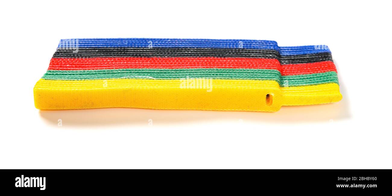multi-color velcro cable tie and cable on white Stock Photo
