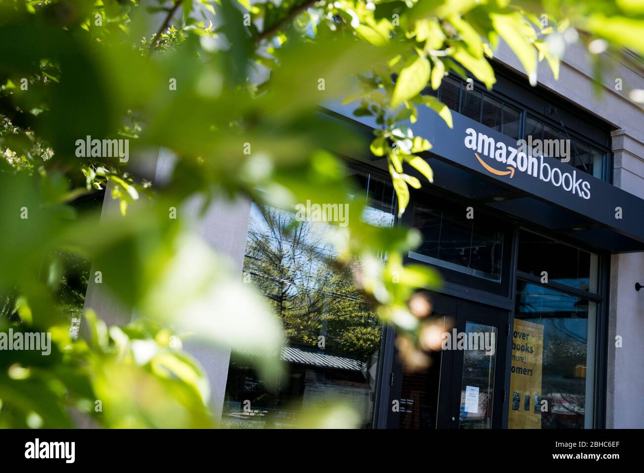 A logo sign outside of a Amazon Books retail store location in Bethesda ...