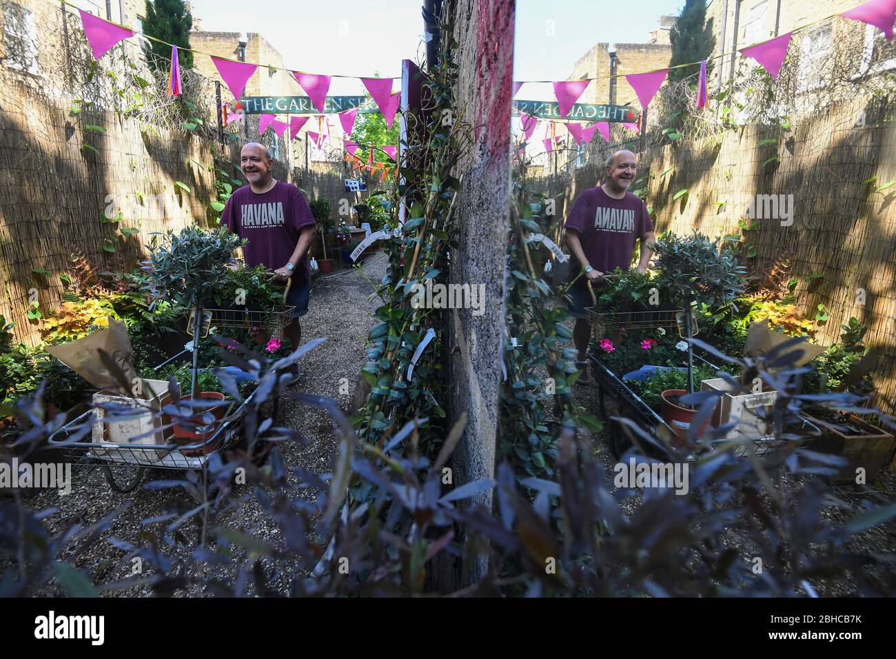 Gardener Jules Ward prepares plants for delivery at Battersea Flower