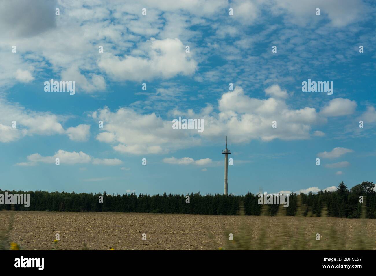 GSM transceiver tower in the country, base transceiver station (BTS), cellular technology. Concept global networking Stock Photo