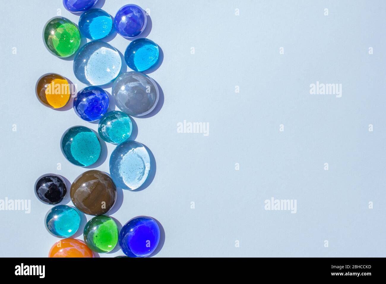 Abstract design texture background of bright colorful glass drop dragon