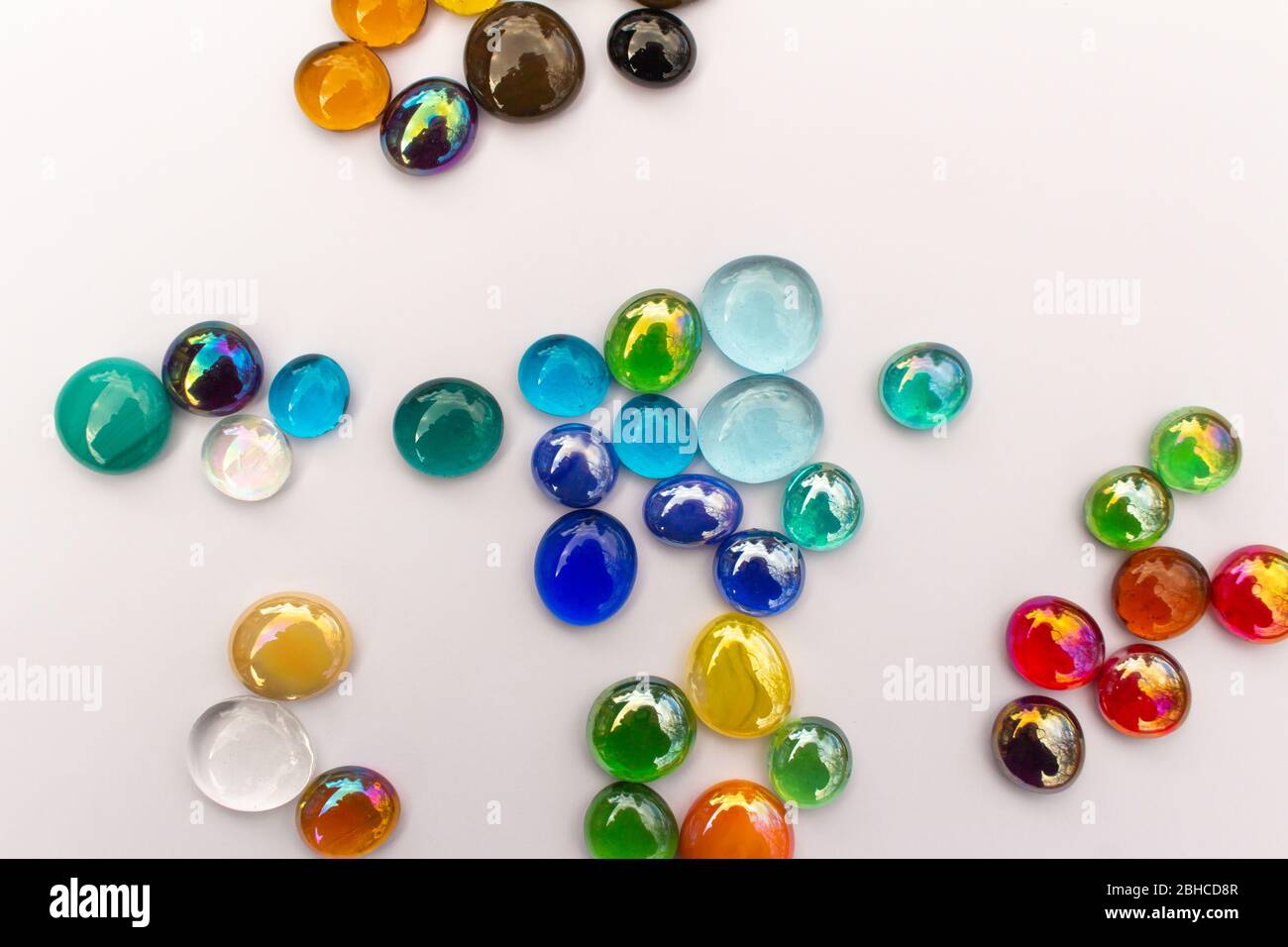 Abstract design texture background of bright colorful glass drop dragon