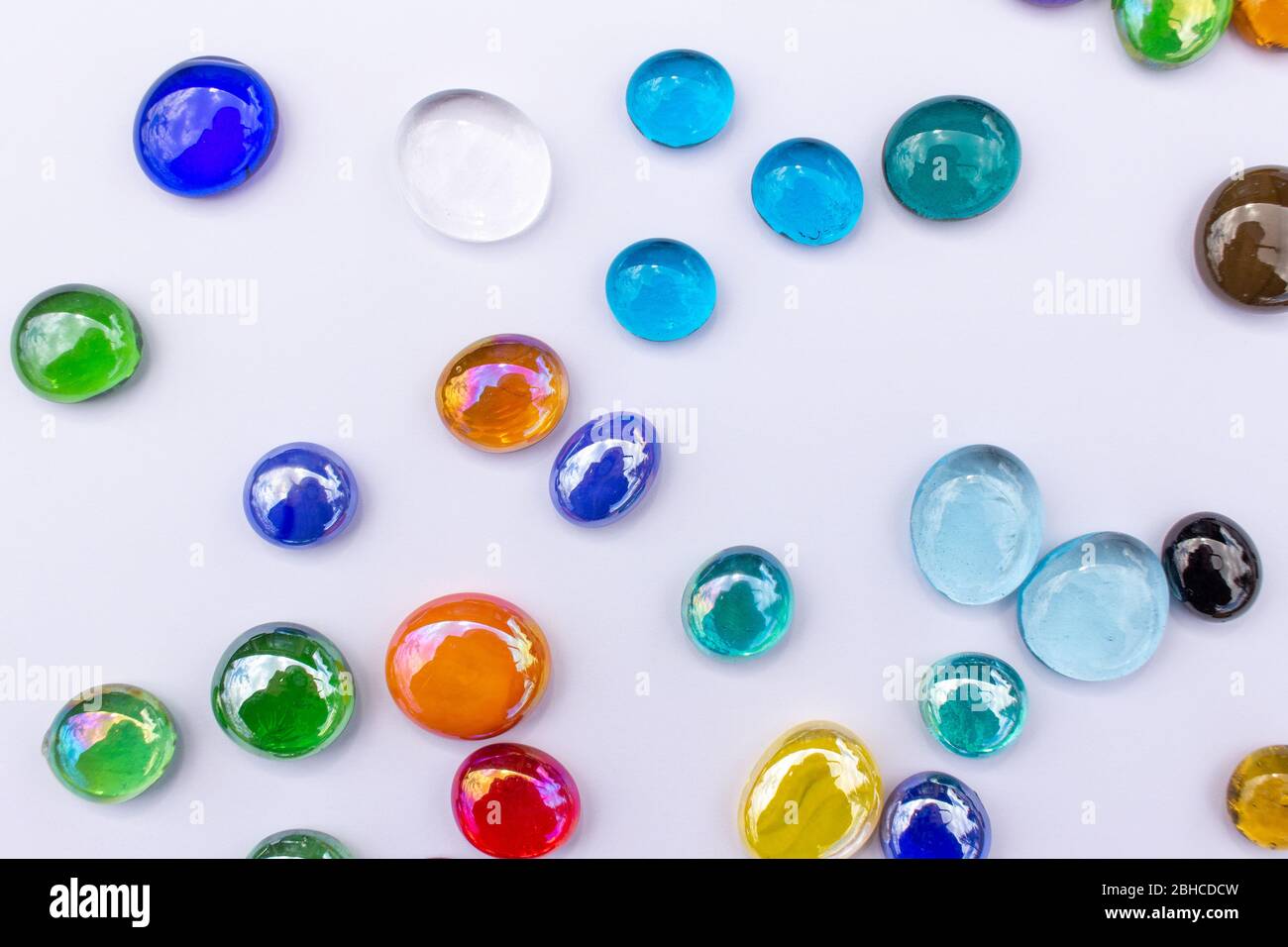 Abstract design texture background of bright colorful glass drop dragon